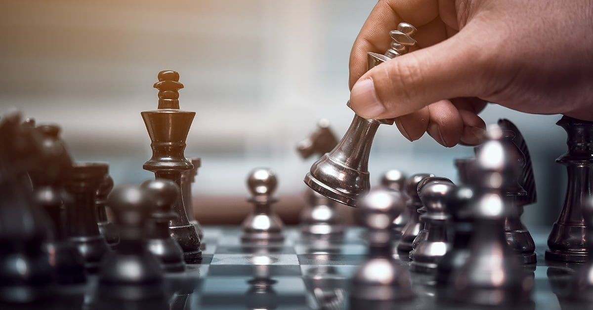 A chess game illustrating the strategy of outsourcing software development