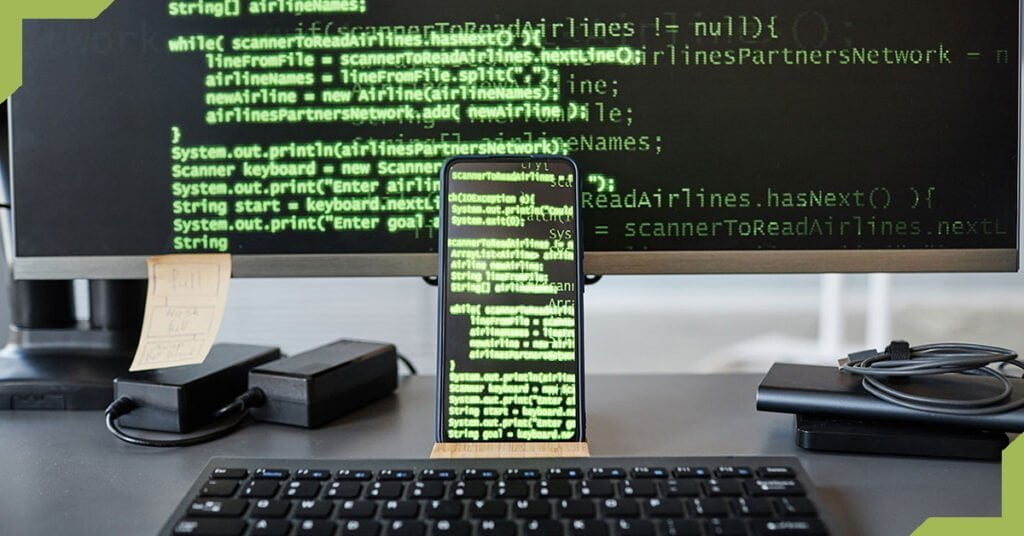 A visual illustration of device screens filled with code while creating mobile app development